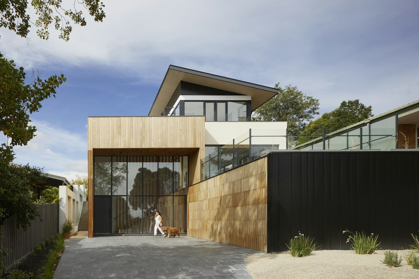 Restrained contemporary house with layered architectural volumes